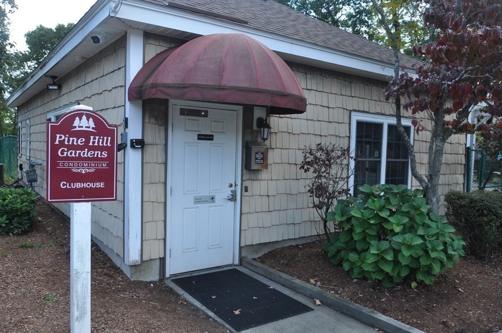 90 Beacon Street, Unit 8 Lawrence, MA 01843 - Photo 18 of 26 a front view of a house with a garden