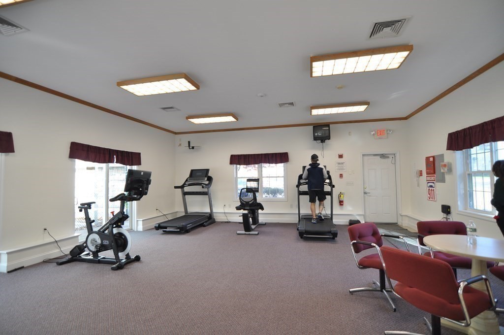 90 Beacon Street, Unit 8 Lawrence, MA 01843 - Photo 19 of 26 a view of a room with gym equipment