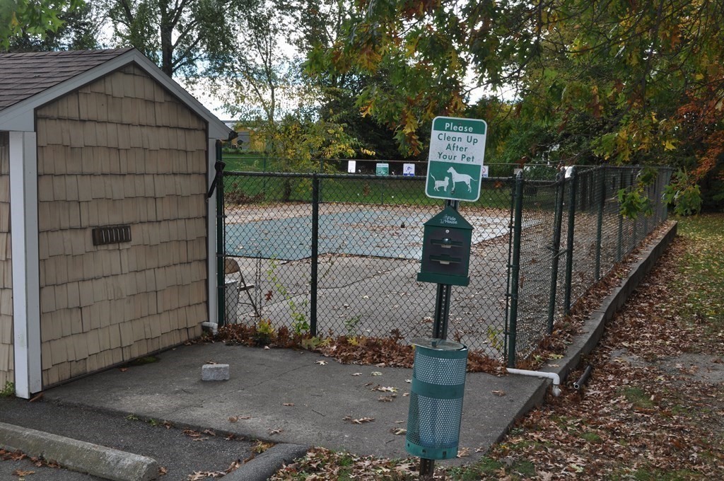 90 Beacon Street, Unit 8 Lawrence, MA 01843 - Photo 25 of 26 a front view of a house with garden