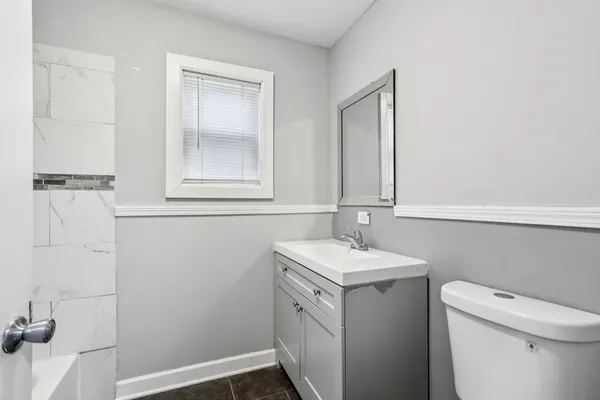 a bathroom with a sink and a toilet