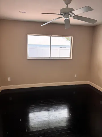 a bathroom with a shower and a toilet