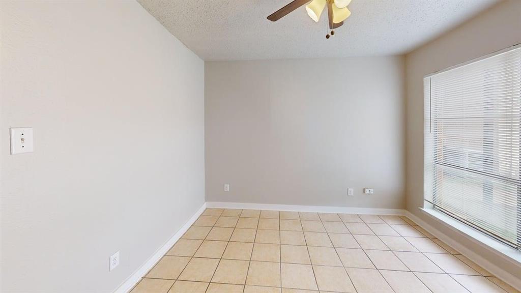 8110 Skillman Street, Unit 1046 Dallas, TX 75231 - Photo 8 of 10 a view of an empty room