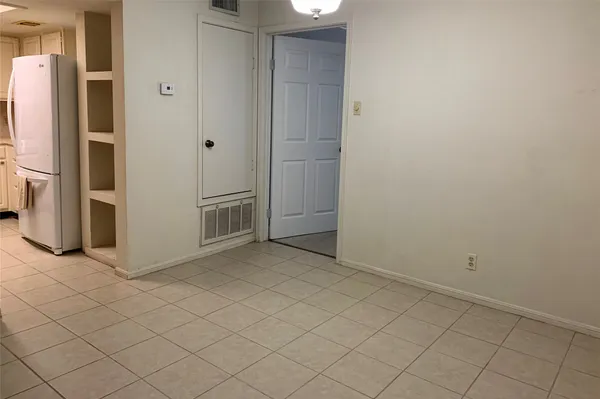 a view of a utility room with empty racks