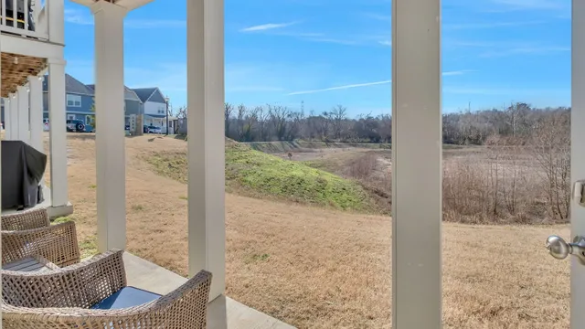 a view of balcony with furniture