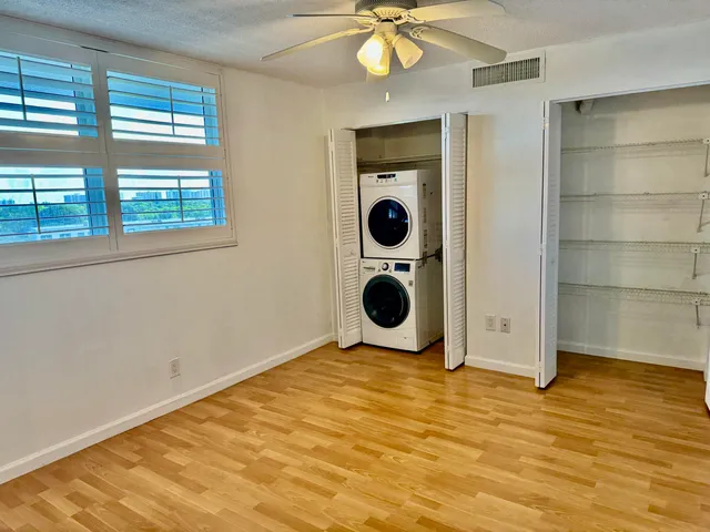a view of a kitchen with a sink