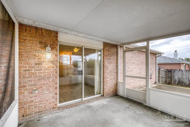 a view of an empty room and window