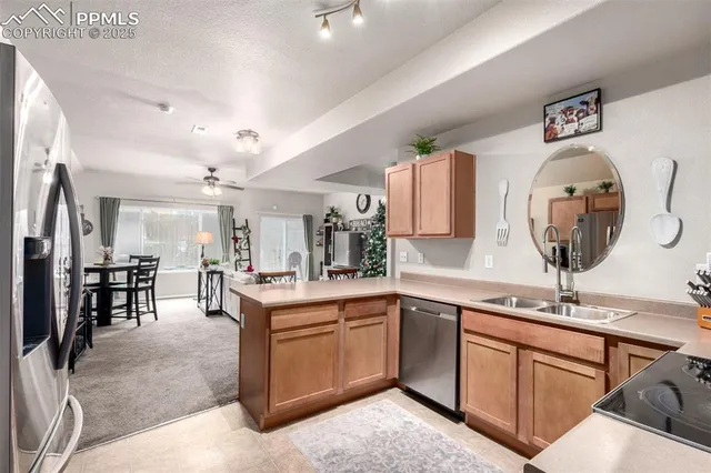 a kitchen with lots of counter top space and dining table