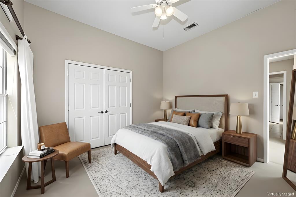 4202 Timberglen Road Dallas, TX 75287 - Photo 34 of 40 Vaulted ceiling, ceiling fan, window with curtain rod, paneled bi-fold doors, and neutral wall color