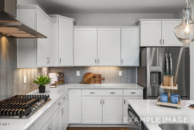 a spacious bathroom with a shower and a sink