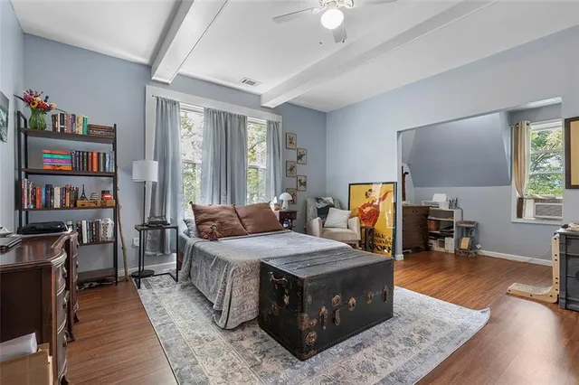 a view of a balcony with wooden floor