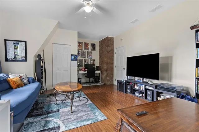 a bathroom with a sink toilet and a mirror