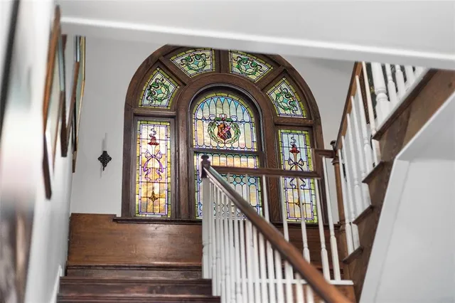 a kitchen with a refrigerator and a sink