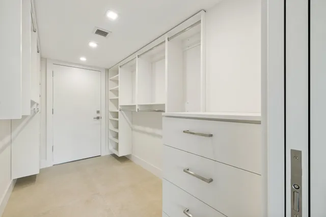 a bed room with a bed and a couch