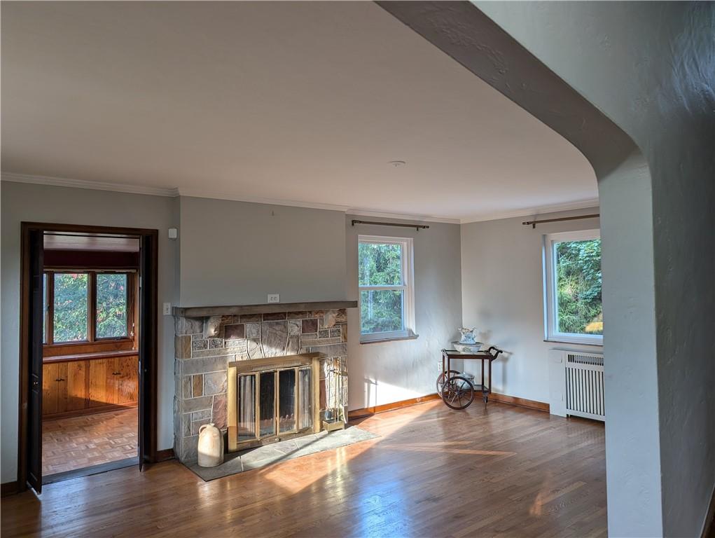 2411 Nicholson Road Sewickley, PA 15143 - Photo 4 of 27 Living Room showing view to Den Windows let in lots of natural light