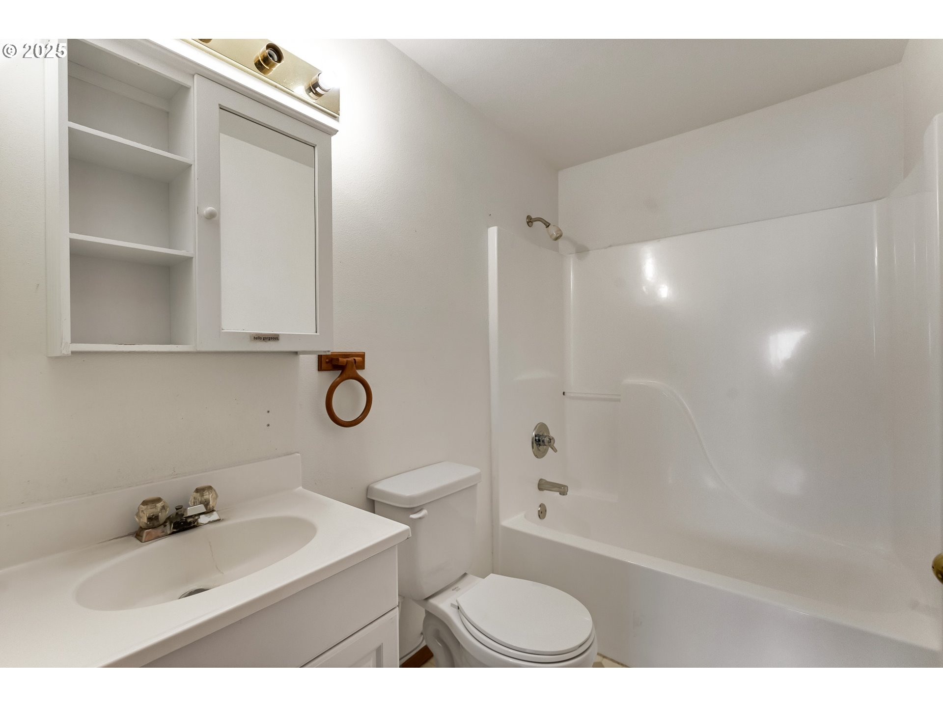 34130 Pintail Avenue Nehalem, OR 97131 - Photo 12 of 25 a bathroom with a sink toilet a mirror and shower