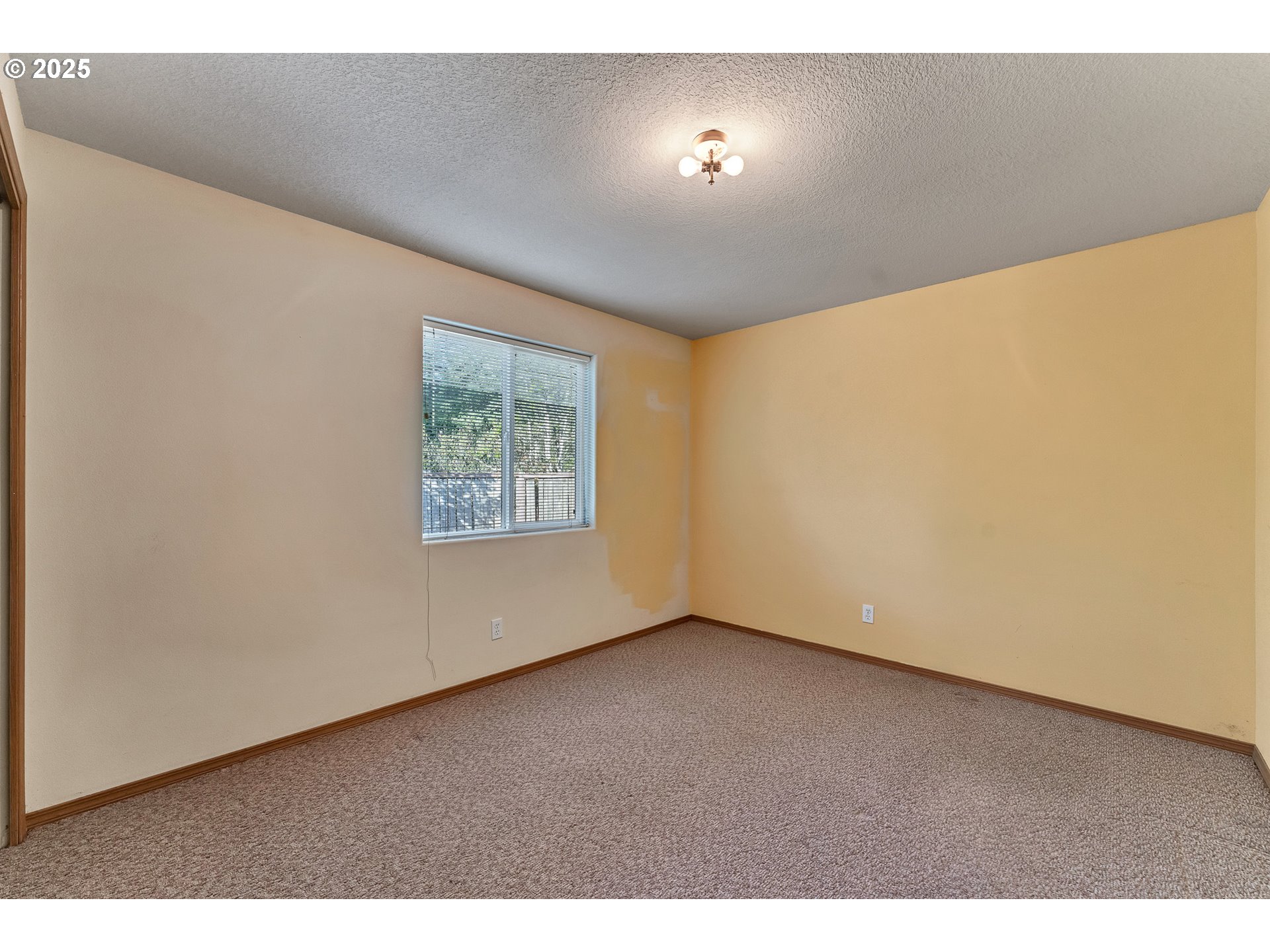 34130 Pintail Avenue Nehalem, OR 97131 - Photo 15 of 25 a view of an empty room with a window