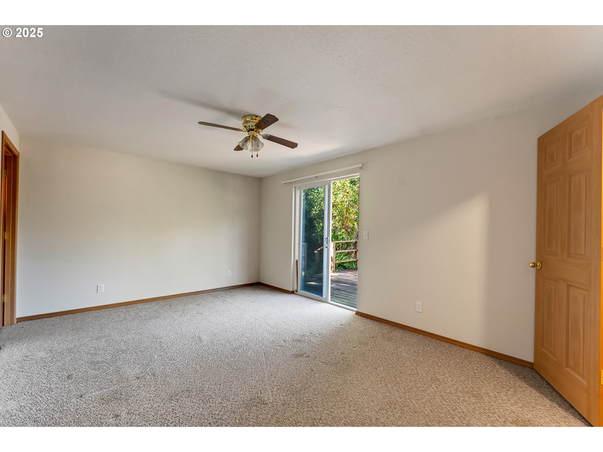 34130 Pintail Avenue Nehalem, OR 97131 - Photo 17 of 25 a view of an empty room with a window