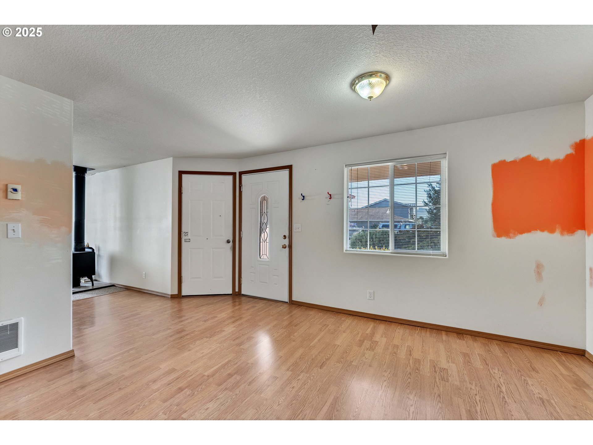34130 Pintail Avenue Nehalem, OR 97131 - Photo 10 of 25 a view of an empty room with a window