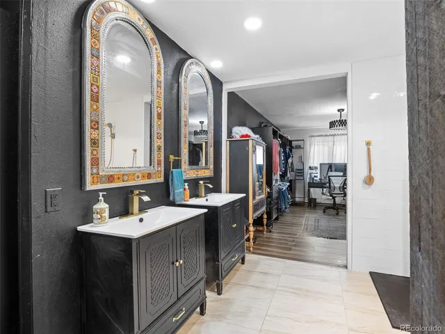 a bathroom with a bathtub and shower