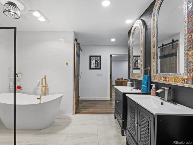 a bathroom with a shower and a sink