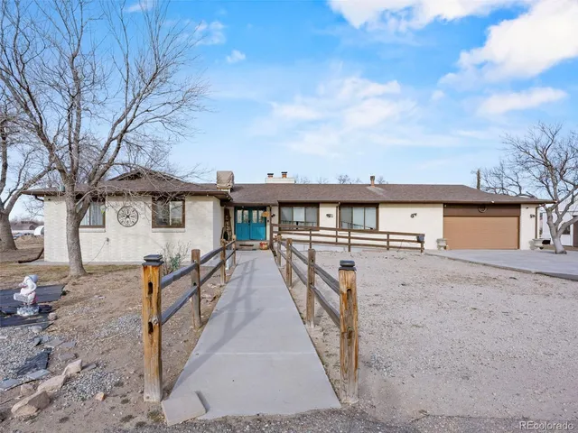 a view of house with outdoor space