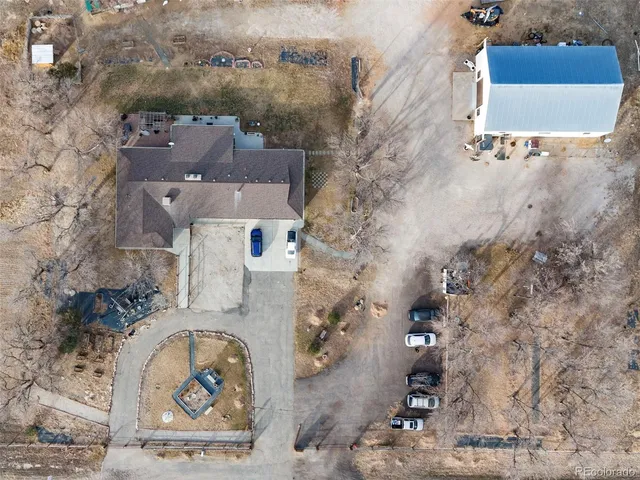a front view of a house with parking area