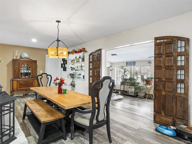 a view of a living room and kitchen