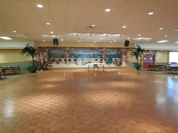 a view of a big room with gym equipment