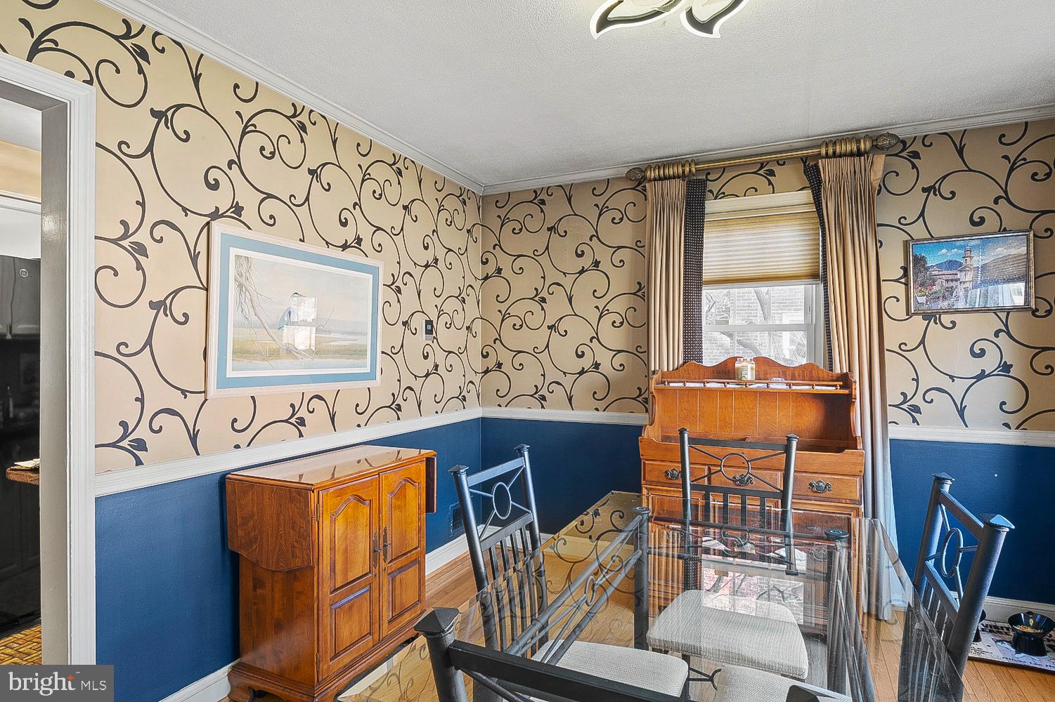 1002 Dennis Avenue Silver Spring, MD 20901 - Photo 17 of 37 a dining room with furniture and window