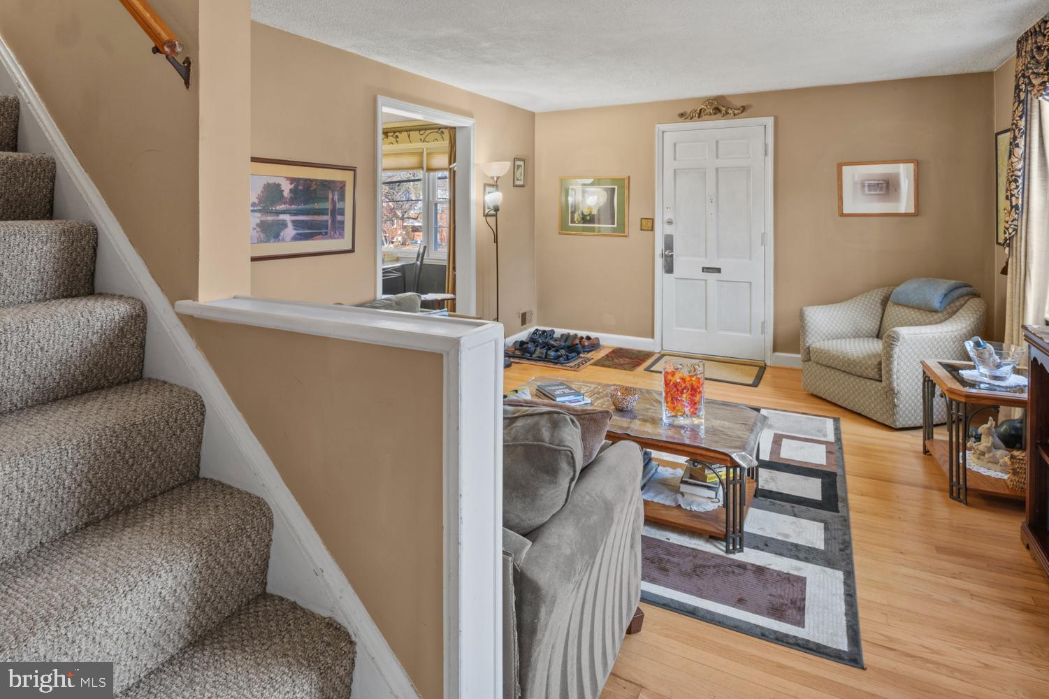 1002 Dennis Avenue Silver Spring, MD 20901 - Photo 7 of 37 a living room with furniture and wooden floor