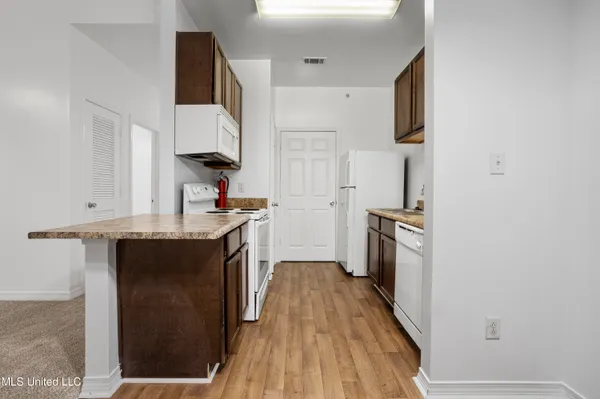 $230,000 | 310 Holcomb Boulevard, Unit 323, Ocean Springs, MS 39564