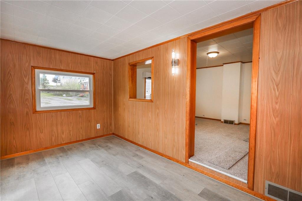 224 Boyers Road Harrisville, PA 16038 - Photo 11 of 28 an empty room with windows and closet