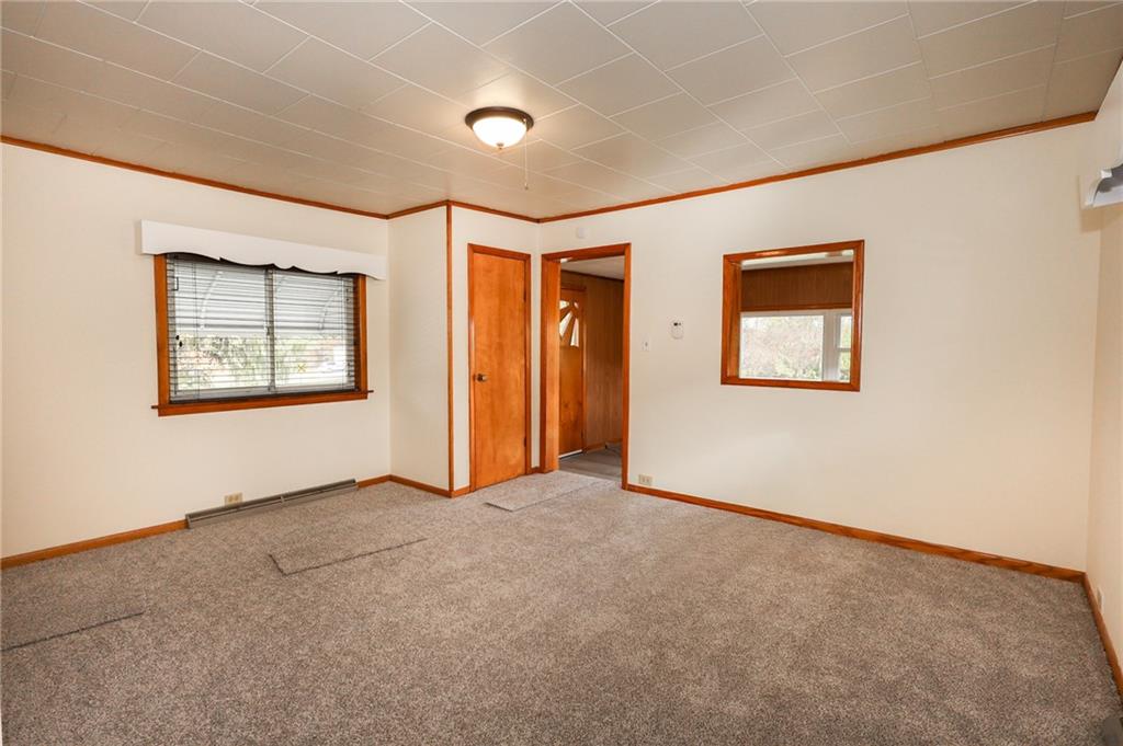 224 Boyers Road Harrisville, PA 16038 - Photo 13 of 28 an empty room with windows and closet