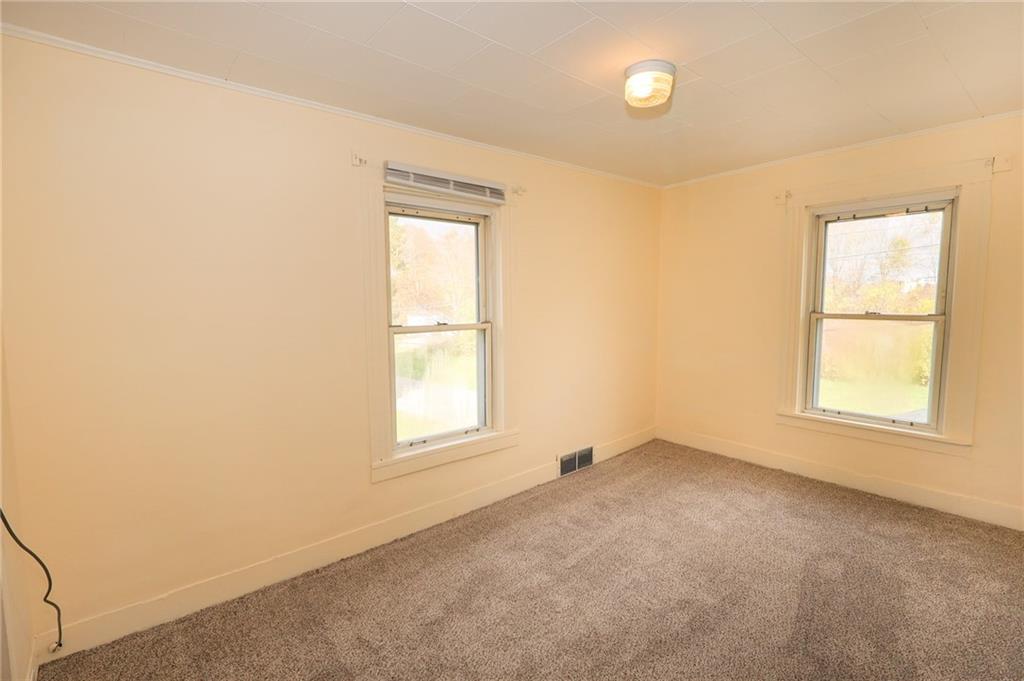 224 Boyers Road Harrisville, PA 16038 - Photo 21 of 28 an empty room with windows