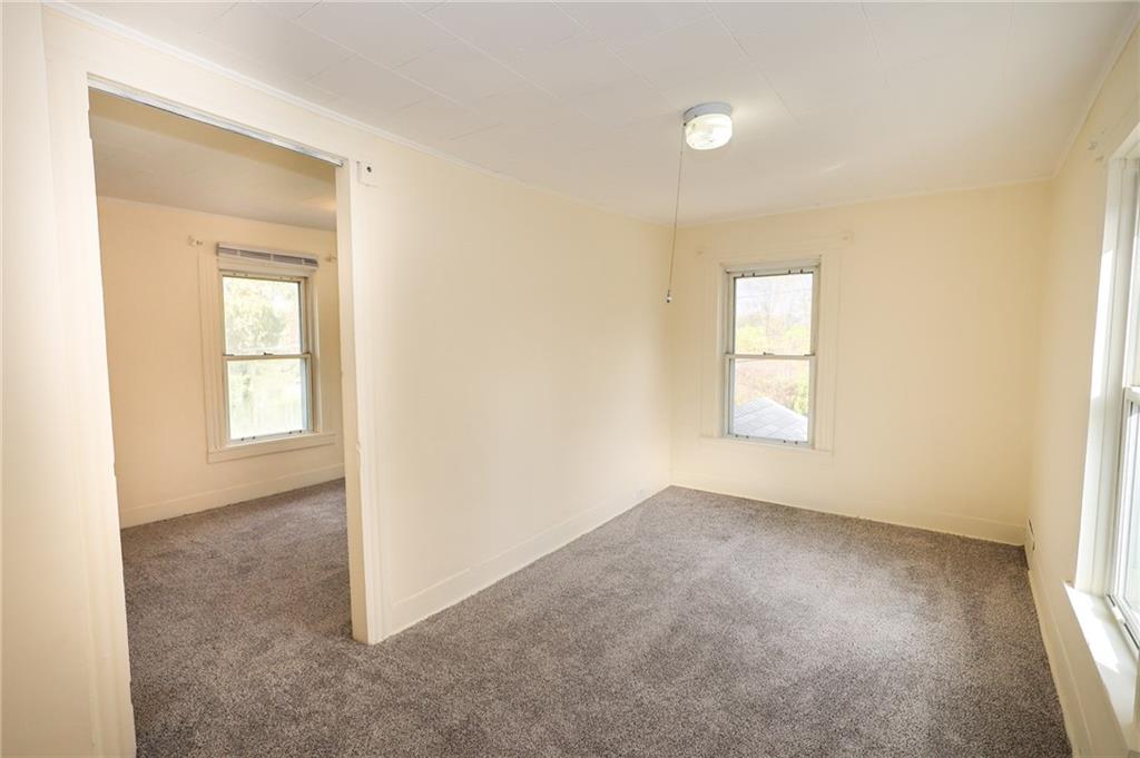 224 Boyers Road Harrisville, PA 16038 - Photo 23 of 28 an empty room with windows and closet
