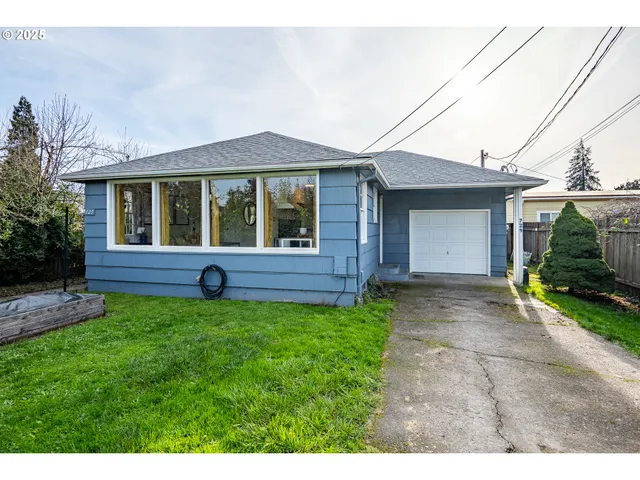 a view of a backyard of the house
