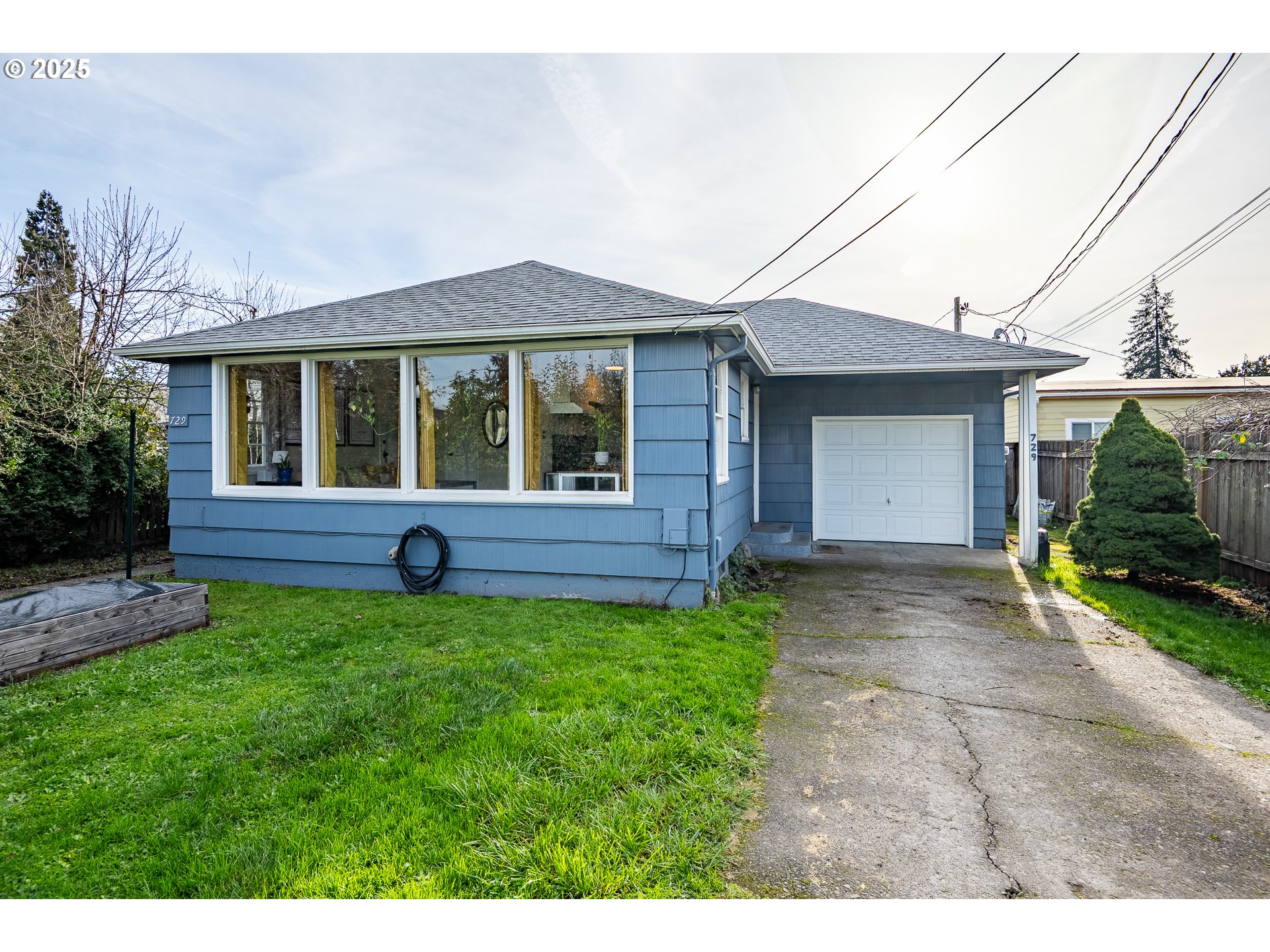a view of a backyard of the house