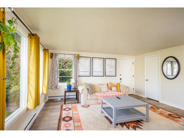 a kitchen with kitchen island a sink stainless steel appliances and cabinets