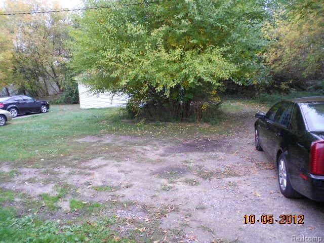 214 1st Street Rochester, MI 48307 - Photo 3 of 19 Rear Lot for Parking