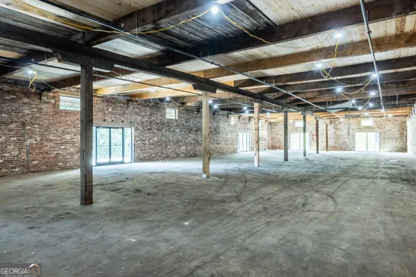 a view of a room with wooden walls