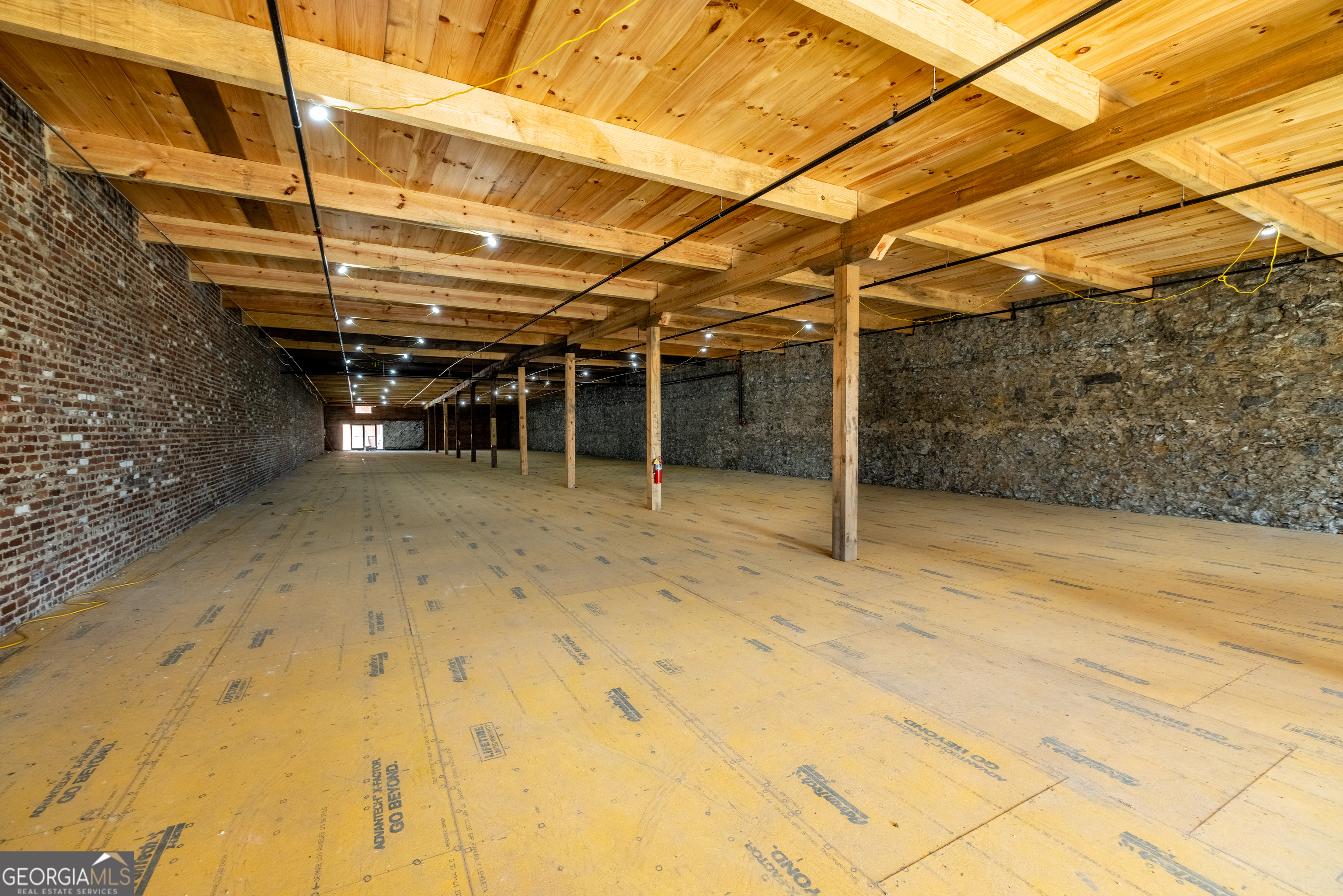 314 East 1st Avenue Rome, GA 30161 - Photo 16 of 16 a view of a room with wooden walls