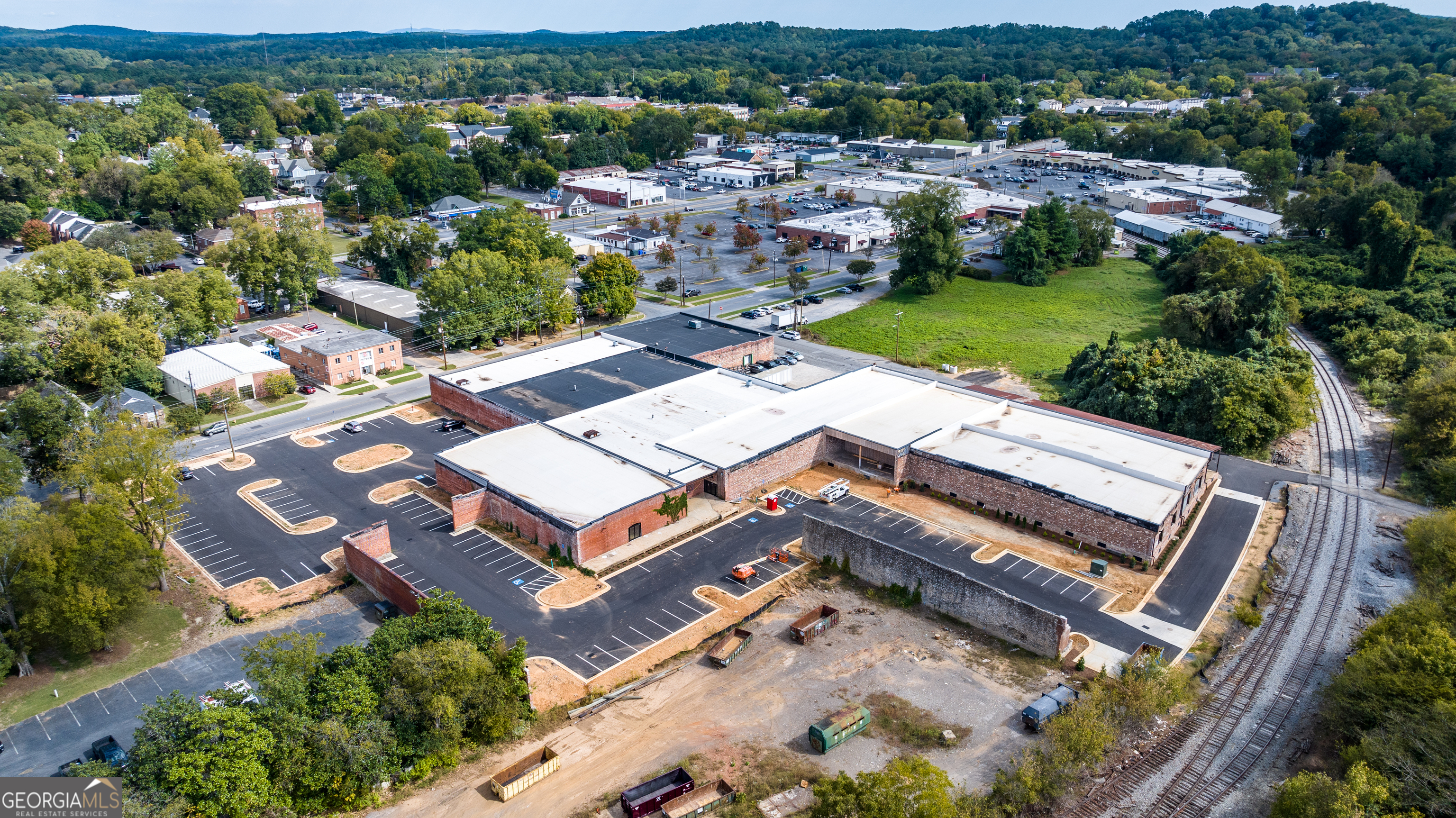 314 East 1st Avenue Rome, GA 30161 - Photo 2 of 16 an aerial view of a house with a garden