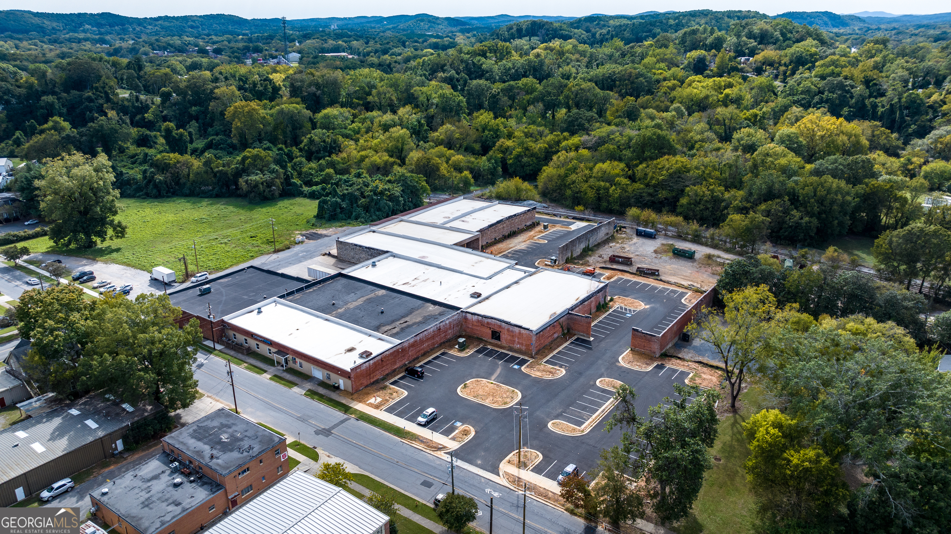 314 East 1st Avenue Rome, GA 30161 - Photo 3 of 16 an aerial view of a house with a garden