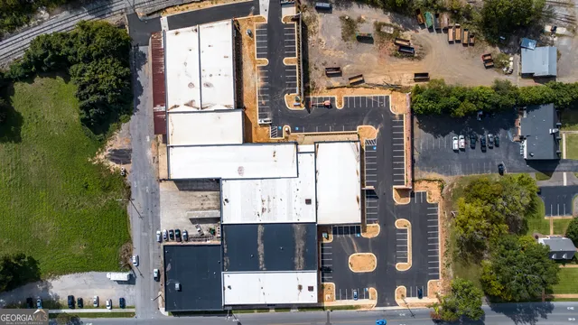 an aerial view of a house with a garden