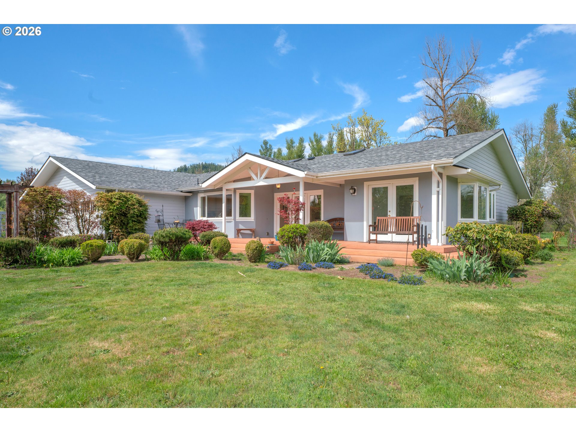 7924 Thurston Road Springfield, OR 97478 - Photo 2 of 45 a front view of a house with a yard