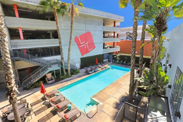 a view of swimming pool with a patio