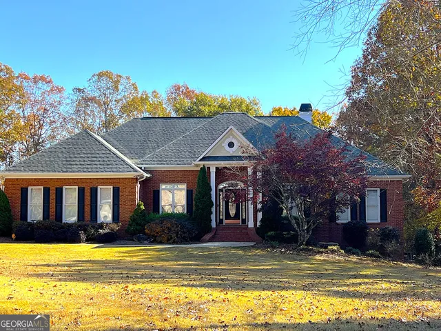 a view of a house with a swimming pool