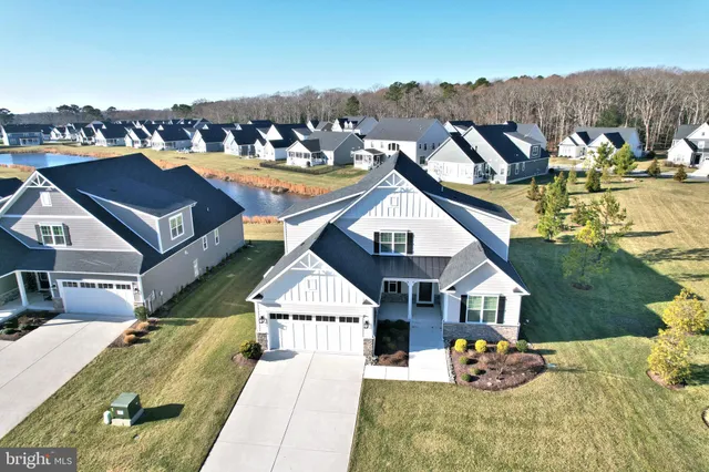 a aerial view of a house with a big yard