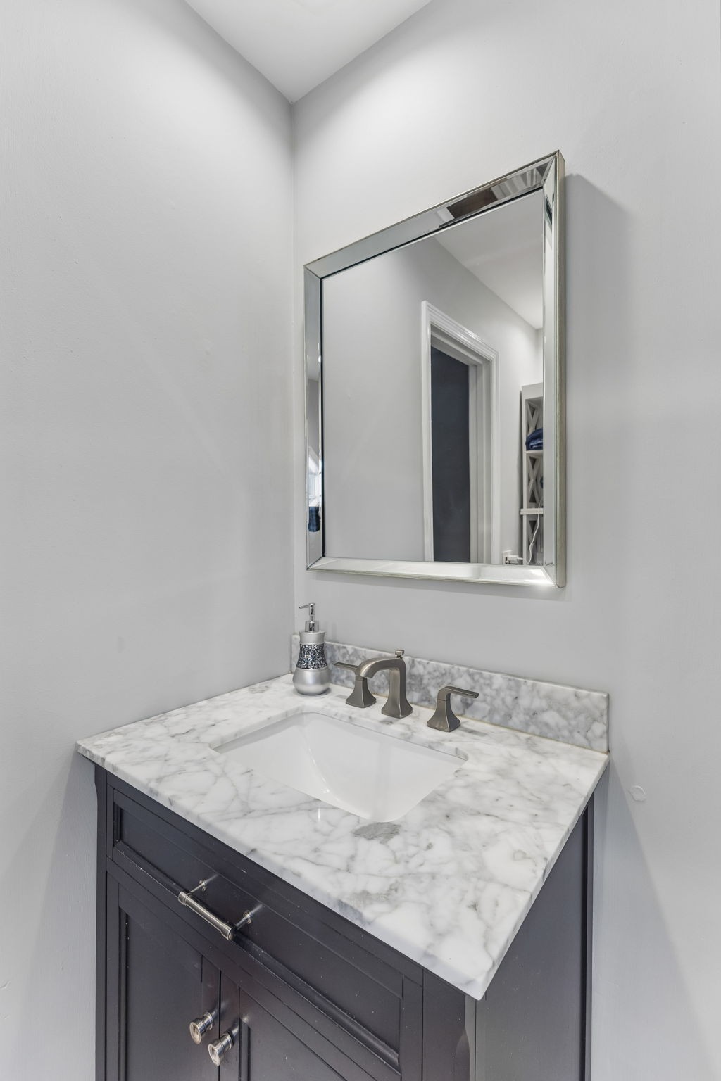 4425 Prescott Road Nashville, TN 37204 - Photo 23 of 36 a bathroom with a granite countertop sink and a mirror