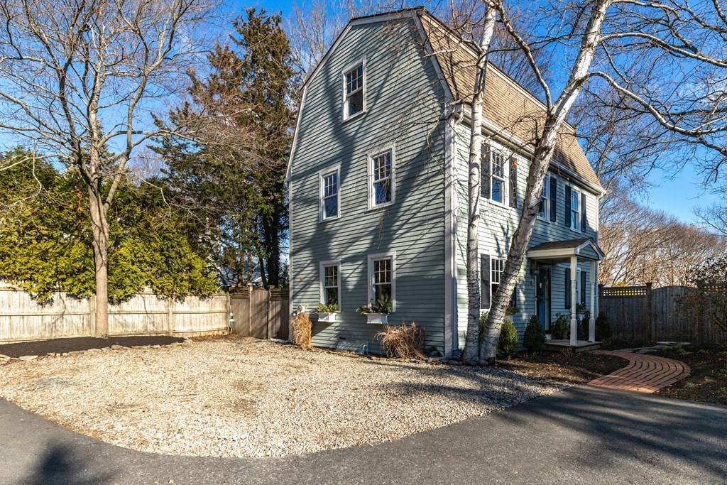 4 Abernathy Way Marblehead, MA 01945 - Photo 1 of 28 a view of a house with a yard covered in snow